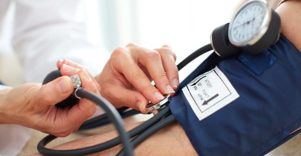 Blood pressure measuring. Doctor and patient.  Health care.